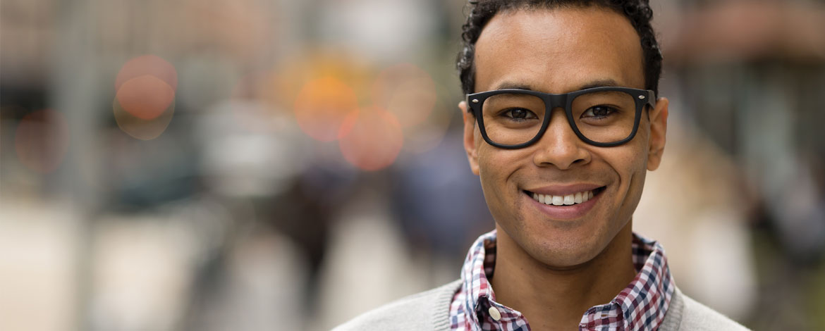 black man smiling eyeglasses